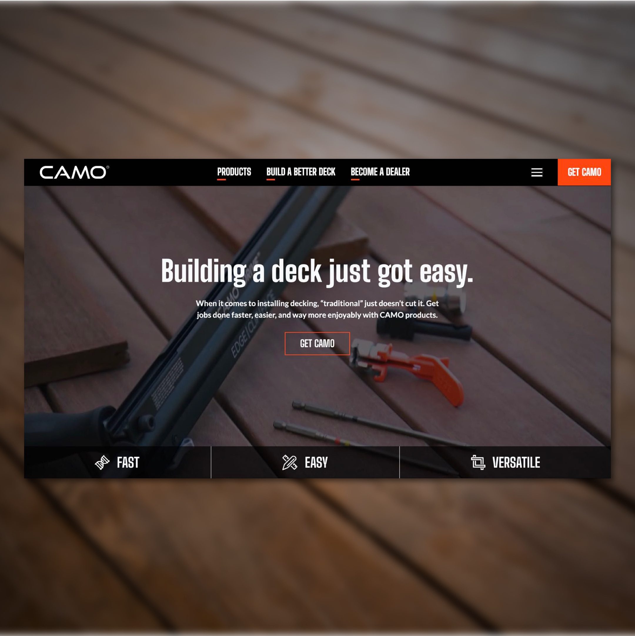 Image of CAMO homepage on top of blurry background texture of decking.